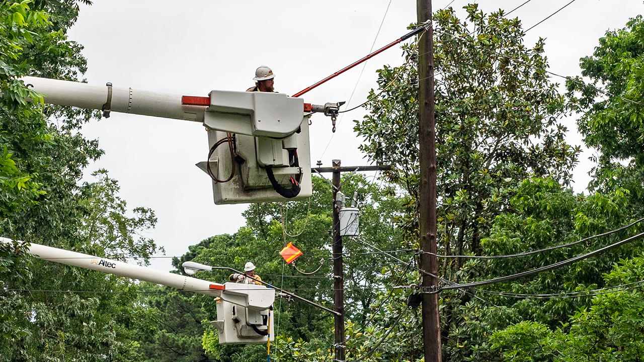 Crews in Jackson, Mississippi restore power outages caused by Tropical Storm Cristobal.